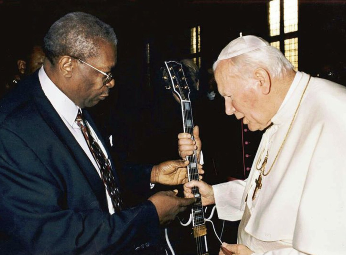 Pope John Paul II checking out B.B. King’s guitar